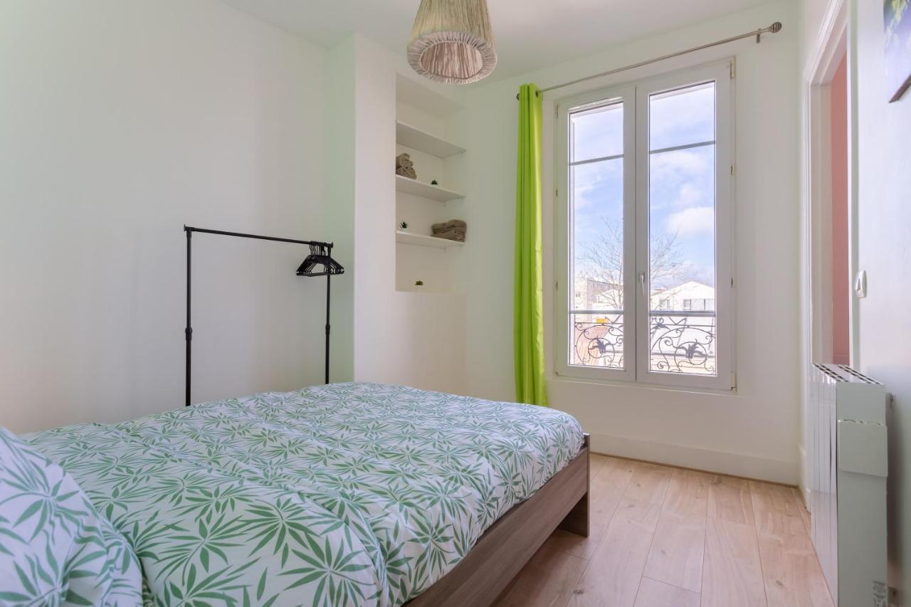 Ferienwohnung Le charme haussmannien-10 min Paris Argenteuil Exterior foto